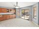 Kitchen/Dining area with sliding doors to the outdoor patio at 13630 W Redfield Rd, Surprise, AZ 85379
