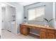 Laundry room features counter space and storage at 13630 W Redfield Rd, Surprise, AZ 85379