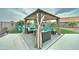 Relaxing outdoor living space with a gazebo and comfortable seating, set on a paved area at 16197 N 157Th Ave, Surprise, AZ 85374