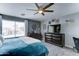 Comfortable bedroom with neutral tones, plush bedding, and stylish decor at 16197 N 157Th Ave, Surprise, AZ 85374