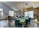 Inviting dining area with ample natural light, stylish furnishings, and seamless flow into the living space at 16197 N 157Th Ave, Surprise, AZ 85374