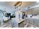The updated kitchen features stylish cabinetry, stainless steel appliances, and an open layout, ideal for cooking and entertaining at 16197 N 157Th Ave, Surprise, AZ 85374
