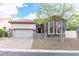 Beautiful single-Gathering home featuring a two-car garage and charming stone accents, perfect for curb appeal at 1659 N Channing --, Mesa, AZ 85207