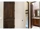Hallway with an open view of a bathroom featuring a decorative vanity at 1659 N Channing --, Mesa, AZ 85207