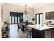 Stylish kitchen flows into the dining area, creating an inviting space for meals and entertaining at 1659 N Channing --, Mesa, AZ 85207