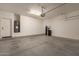 Spacious two car garage with water heater, water filtration system and concrete floor at 18434 E El Buho Pequeno Rd, Gold Canyon, AZ 85118