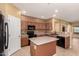 Stylish kitchen featuring a center island, stainless steel appliances, and lots of cabinet space, ideal for entertaining at 18434 E El Buho Pequeno Rd, Gold Canyon, AZ 85118