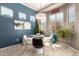 Cozy breakfast nook featuring natural light, stylish decor, and seating for four at 18547 W Sweet Acacia Dr, Goodyear, AZ 85338