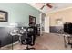 Spacious office features a neutral color scheme and natural light, perfect for a productive work environment at 18547 W Sweet Acacia Dr, Goodyear, AZ 85338