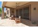 A cozy patio with outdoor seating, perfect for relaxation and enjoying the outdoors at 18547 W Sweet Acacia Dr, Goodyear, AZ 85338