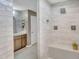 Modern bathroom featuring a walk-in shower, sleek fixtures, and a seamless design, exuding comfort and style at 1974 E Dubois Ave, Gilbert, AZ 85298