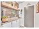 Charming entryway with white cabinets, granite countertops, decorative accents, and a cozy feel at 1974 E Dubois Ave, Gilbert, AZ 85298