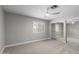 Bedroom with neutral carpet, white trim, and a window at 2153 E Crest Ln, Phoenix, AZ 85024