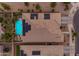 An aerial view of a single-Gathering home with solar panels and a private backyard swimming pool at 22639 E Avenida Del Valle --, Queen Creek, AZ 85142