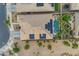 Top down view of a house and solar panels with beautiful desert landscaping, and a sparkling pool at 22639 E Avenida Del Valle --, Queen Creek, AZ 85142