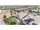 Overhead aerial view of a home with solar panels, a pool, desert landscaping, and a two-car garage at 22639 E Avenida Del Valle --, Queen Creek, AZ 85142