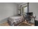 Cozy bedroom with a functional desk space, overhead shelving and neutral colors create a calming atmosphere at 22639 E Avenida Del Valle --, Queen Creek, AZ 85142