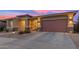 Inviting single-Gathering home featuring a two-car garage and low-maintenance desert landscaping at 22639 E Avenida Del Valle --, Queen Creek, AZ 85142