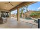 Large covered patio overlooking a refreshing private pool and palm trees at 22639 E Avenida Del Valle --, Queen Creek, AZ 85142
