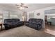 Relaxing living room featuring plush sofas, soft carpet, and bright windows, perfect for Gathering time and guests at 2400 E Baseline Ave # 169, Apache Junction, AZ 85119