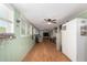 Inviting living room features laminate floors, plenty of room, and storage at 2400 E Baseline Ave # 169, Apache Junction, AZ 85119