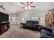 Spacious living room with large windows, soft lighting, and comfortable seating, creating an inviting atmosphere at 2400 E Baseline Ave # 169, Apache Junction, AZ 85119