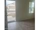 View from home's interior, entryway to street showing front door and window at 24268 W Pecan Rd, Buckeye, AZ 85326