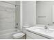 Bathroom featuring a tub-shower combination with marble-like tile at 25484 W Graham Trl, Buckeye, AZ 85326