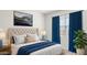 Comfortable bedroom featuring plush bedding, elegant decor, and ample natural light, creating a relaxing atmosphere at 25484 W Graham Trl, Buckeye, AZ 85326
