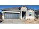 Beautiful single-story home featuring a well-manicured lawn, neutral paint scheme, and a two-car garage at 25484 W Graham Trl, Buckeye, AZ 85326