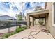 This covered patio offers outdoor enjoyment overlooking a fenced pool and landscaped yard at 28232 N Abby Cir, San Tan Valley, AZ 85143
