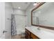 Bathroom showcasing a tub and shower combination and a dark wood vanity at 28232 N Abby Cir, San Tan Valley, AZ 85143