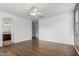 Spacious bedroom with wood laminate flooring, ceiling fan, and natural light at 28232 N Abby Cir, San Tan Valley, AZ 85143