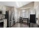 Eat-in kitchen featuring stainless steel appliances and ample counter space at 30100 N Sunray Dr, San Tan Valley, AZ 85143
