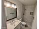 Bathroom featuring sleek vanity and modern tiled shower at 3208 W Bloomfield Rd, Phoenix, AZ 85029
