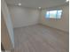 Bright bedroom features recessed lighting, modern floors, and a window at 3208 W Bloomfield Rd, Phoenix, AZ 85029