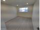 Bright bedroom features recessed lighting, modern floors, and a window at 3208 W Bloomfield Rd, Phoenix, AZ 85029