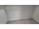 Closet with modern vinyl flooring and a hanging rod and shelf at 3208 W Bloomfield Rd, Phoenix, AZ 85029