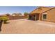 Backyard featuring low-maintenance landscaping and a covered patio at 3843 E Citrine Rd, San Tan Valley, AZ 85143