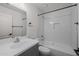 Bathroom with a gray vanity, white subway tile, and bathtub shower combination at 3843 E Citrine Rd, San Tan Valley, AZ 85143
