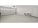 Spacious two car garage with concrete floors and paneled garage door at 3843 E Citrine Rd, San Tan Valley, AZ 85143