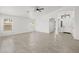 Spacious living room with tile floors, neutral paint, and recessed lights, with a large window offering plenty of natural light at 3843 E Citrine Rd, San Tan Valley, AZ 85143