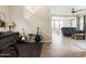 Open-concept living area showcasing neutral tones, staircase, and seamless transitions between spaces at 3952 E Frances Ln, Gilbert, AZ 85295