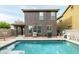 Back exterior view of home featuring a private swimming pool, patio, and outdoor grill at 3952 E Frances Ln, Gilbert, AZ 85295