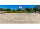 Community basketball court with a clean playing surface offers a great space for recreation and exercise at 4044 S 58Th Ln, Phoenix, AZ 85043