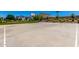 Basketball court features a well-maintained surface and hoops, providing residents with a recreational amenity at 4044 S 58Th Ln, Phoenix, AZ 85043