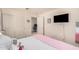 Bedroom showcasing a queen bed, large closet, and an adjoining study room at 4044 S 58Th Ln, Phoenix, AZ 85043
