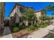 Charming home showcasing manicured landscaping with lush green shrubs and mature trees at 4044 S 58Th Ln, Phoenix, AZ 85043