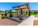 Community pavilion features picnic tables and shaded seating, perfect for outdoor gatherings and relaxation at 4044 S 58Th Ln, Phoenix, AZ 85043