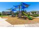 Community playground with slides and climbing structure offers a fun and safe play area for children at 4044 S 58Th Ln, Phoenix, AZ 85043